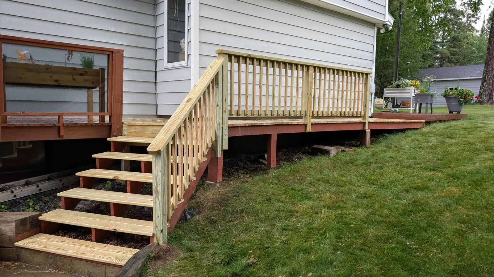 Deck construction in progress showing framing and layout