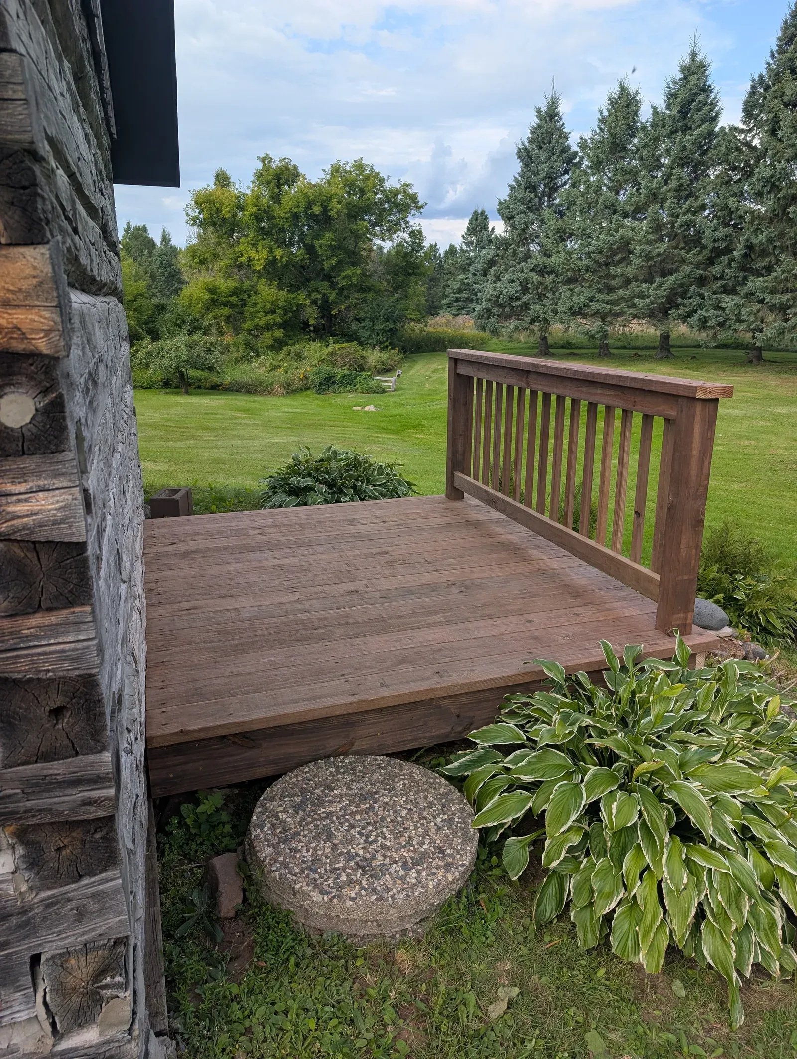 Completed deck rebuild with new decking boards and railing