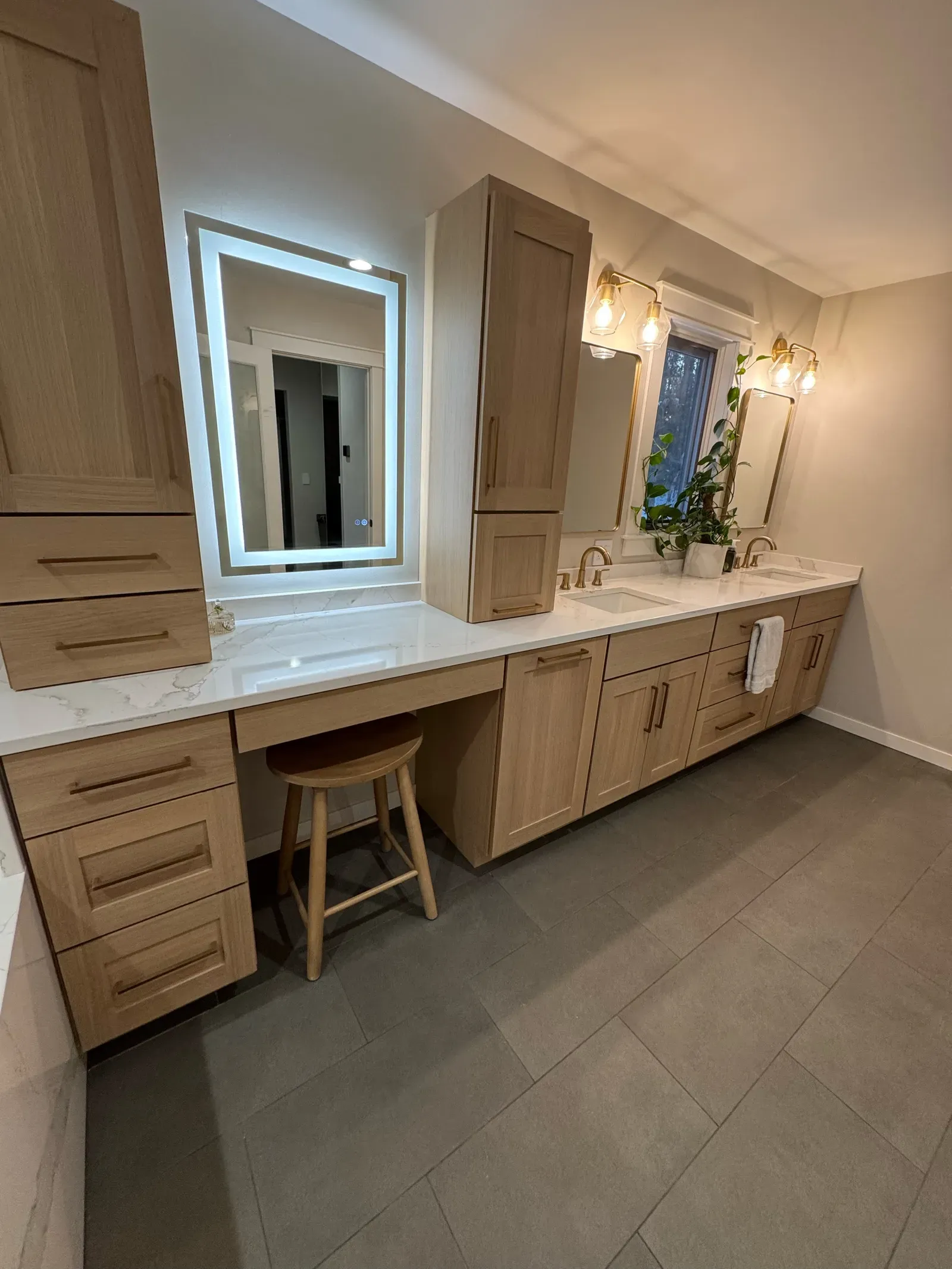 Additional master bathroom view showing completed renovation details